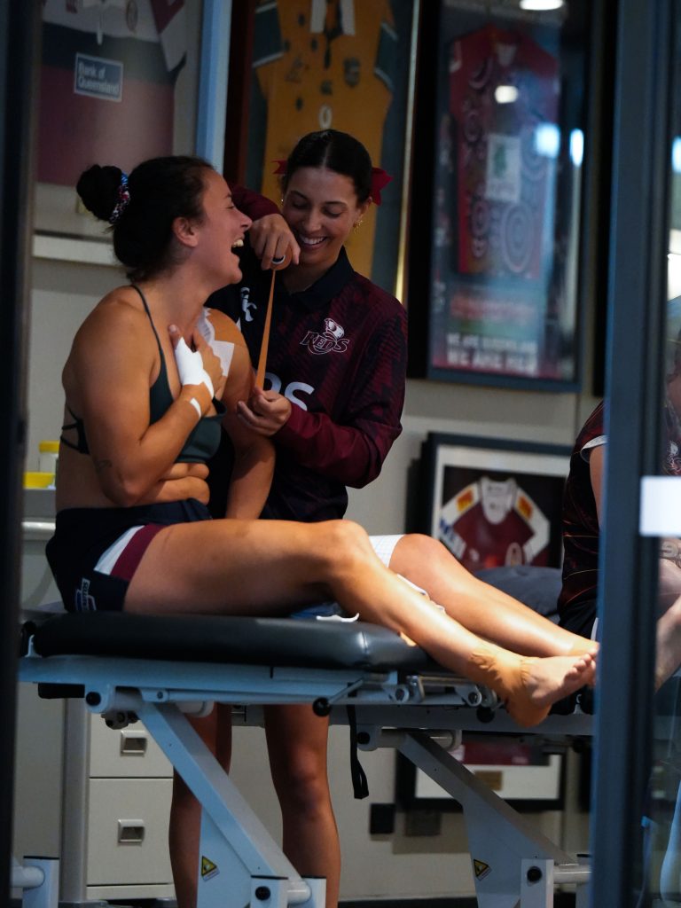 Physiotherapist Kharis Jayawardhana providing treatment to rugby player